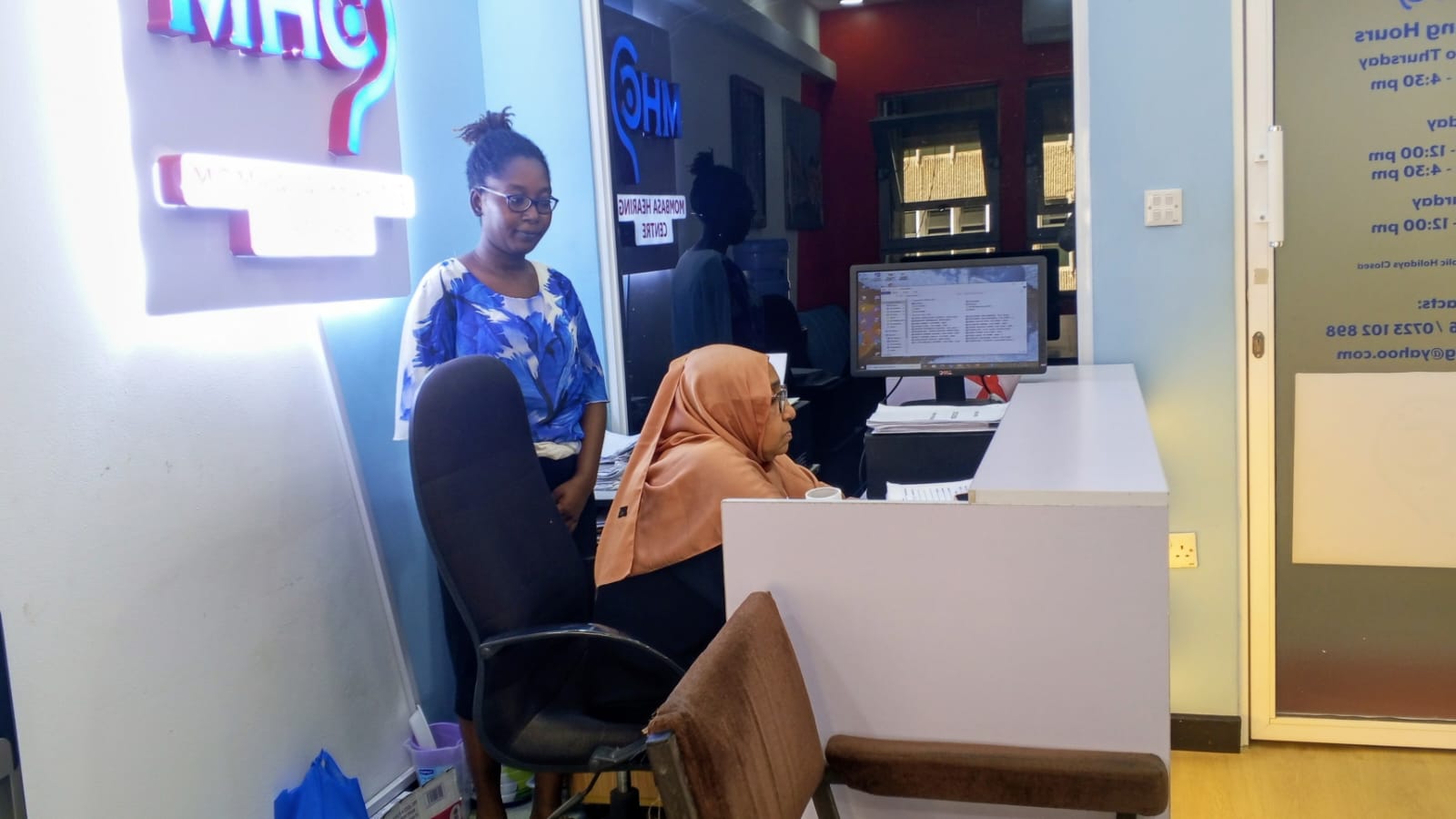 Mombasa Hearing Centre front-desk team assisting with patient registration